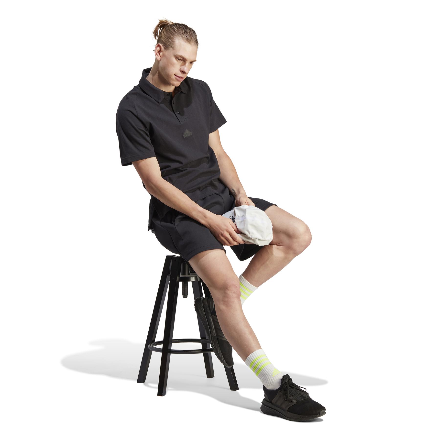 product/a/d/adidas_ia3124_6_apparel_on_model_walking_view_white.jpg