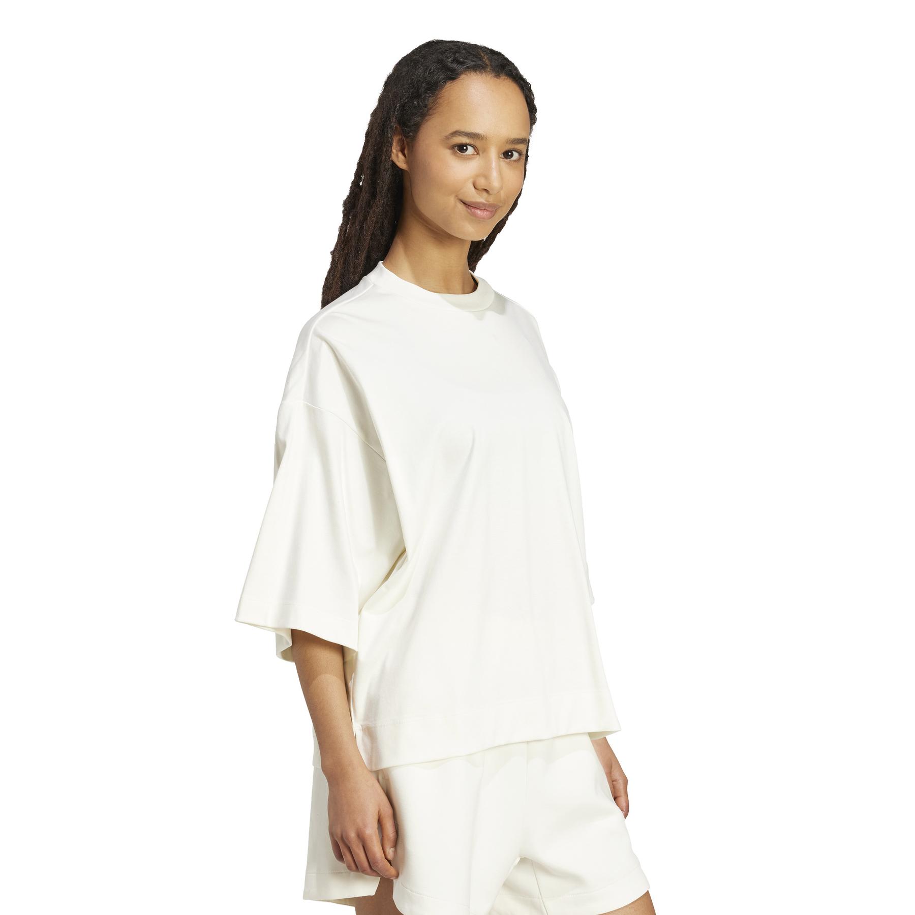 product/a/d/adidas_jv9888_4_apparel_on_model_walking_view_white.jpg